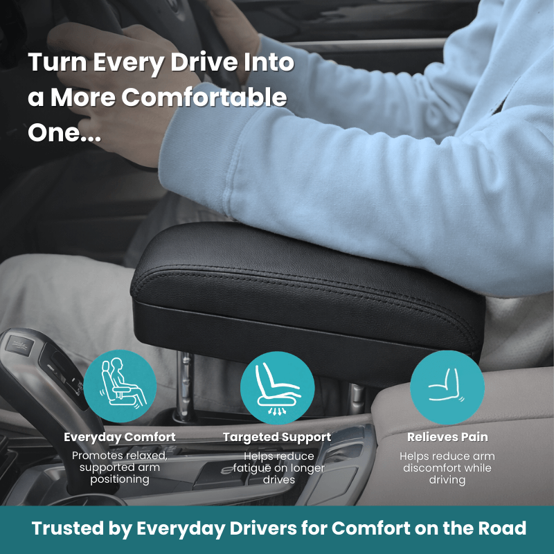 Driver resting a forearm on the ErgoDrive armrest cushion for relaxed, supported arm positioning while driving